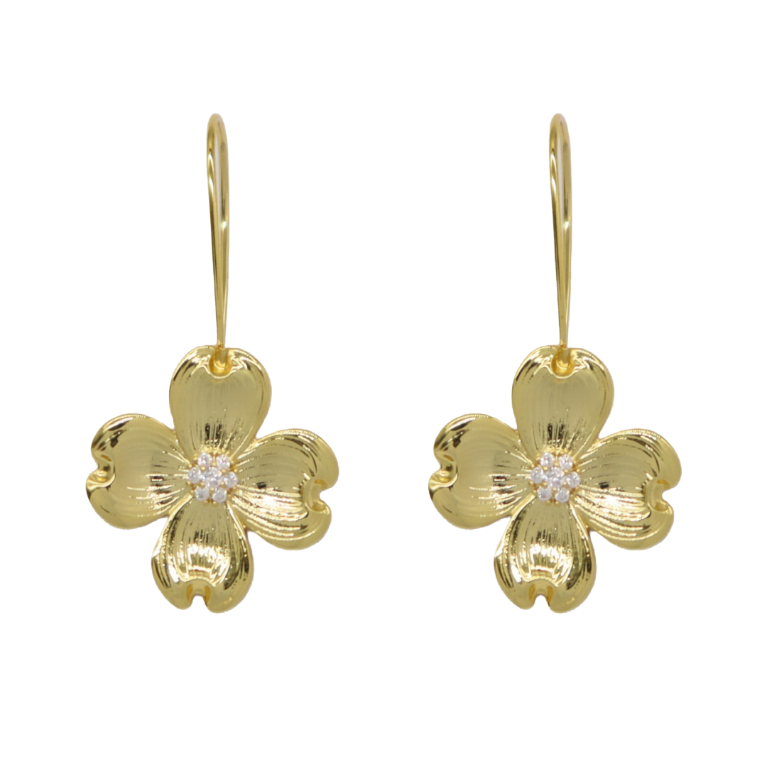 A pair of gold flower drop earrings with textured petals and a small clear crystal center, shown on a plain white background.