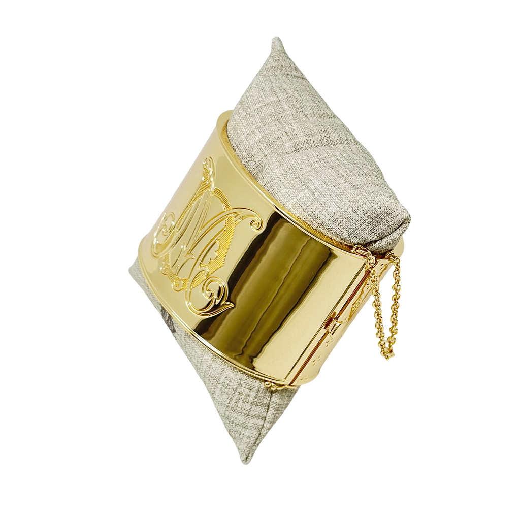 Gold bracelet with two initials on the front