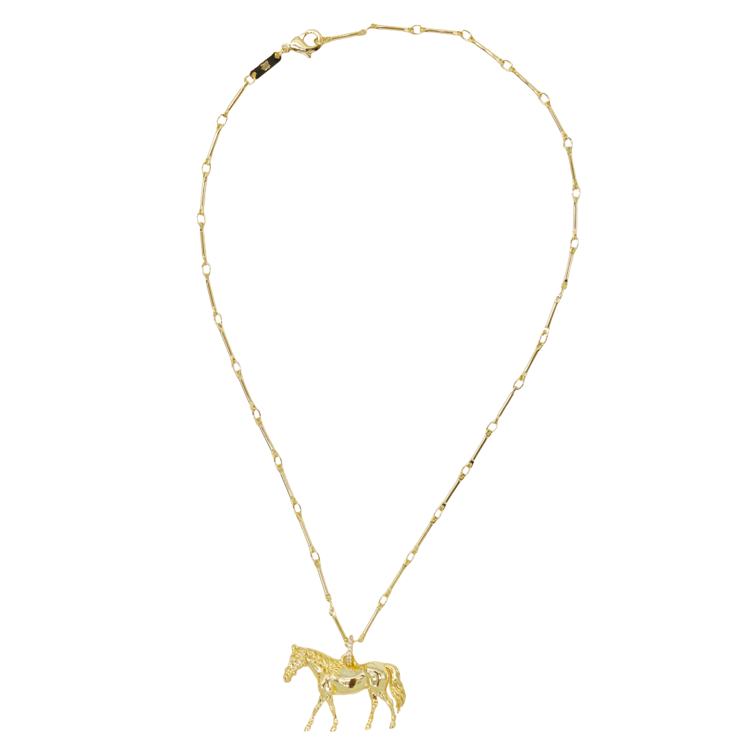 A gold necklace featuring a delicate chain with small linked beads and a detailed horse pendant, displayed on a clean white background.